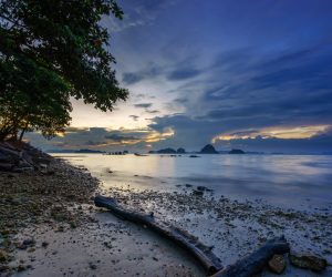 Beautiful Tropical beach at sunset at summer resort