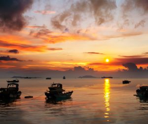 China Hainan,shanya sunset silhouette and boats